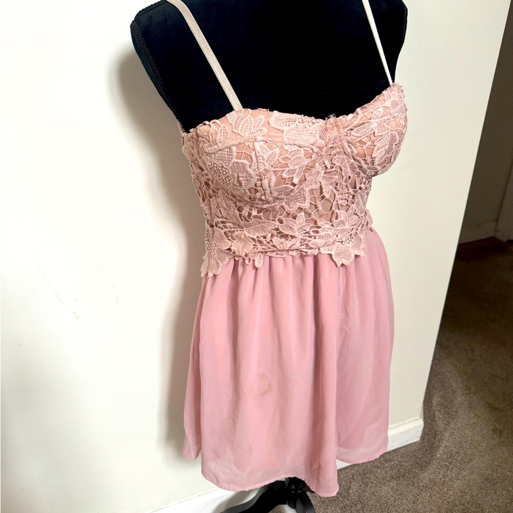 Pink straps dress.